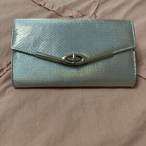 Silver metallic/iridescent clutch with a sleek design.